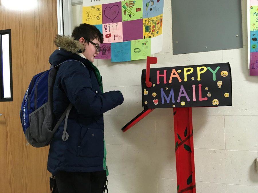 Students can send happy mail or take happy mail from this colorful box in the main hallway. The idea is to spread positive messages around Patrick M. Villano School.