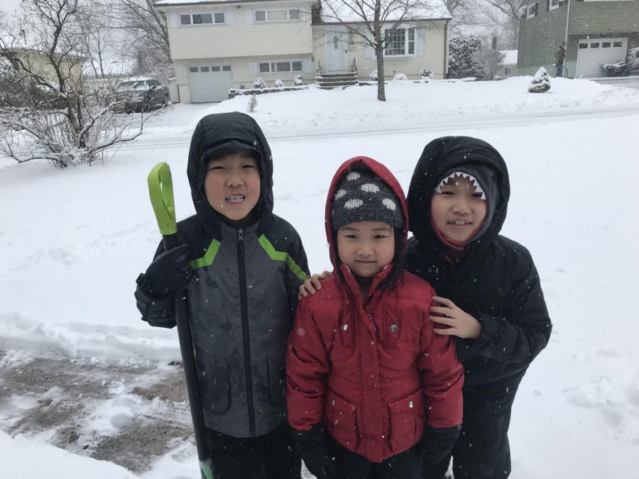 Snow+days+mean+more+time+for+these+siblings+to+play+outside.+The+trio+also+helped+their+family+and+neighbors+clear+the+snow+from+walkways+and+driveways.+One+neighbor+surprised+the+boys+with+tips+on+how+to+better+shovel+big+mounds+of+snow.