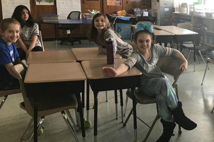 The family of sixth grade math teacher Mrs. Leigh Martin is very excited to participate in this months activity. This family calls themselves the Ferocious Ferrets. All the famlies created fun names for themselves at their first meeting.