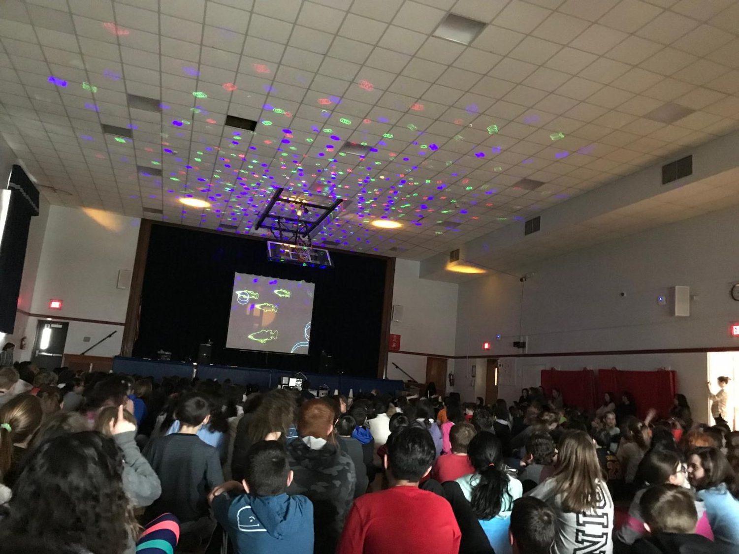Students at Patrick M. Villano School enjoy the laser light show. This year, the message was about integrity.