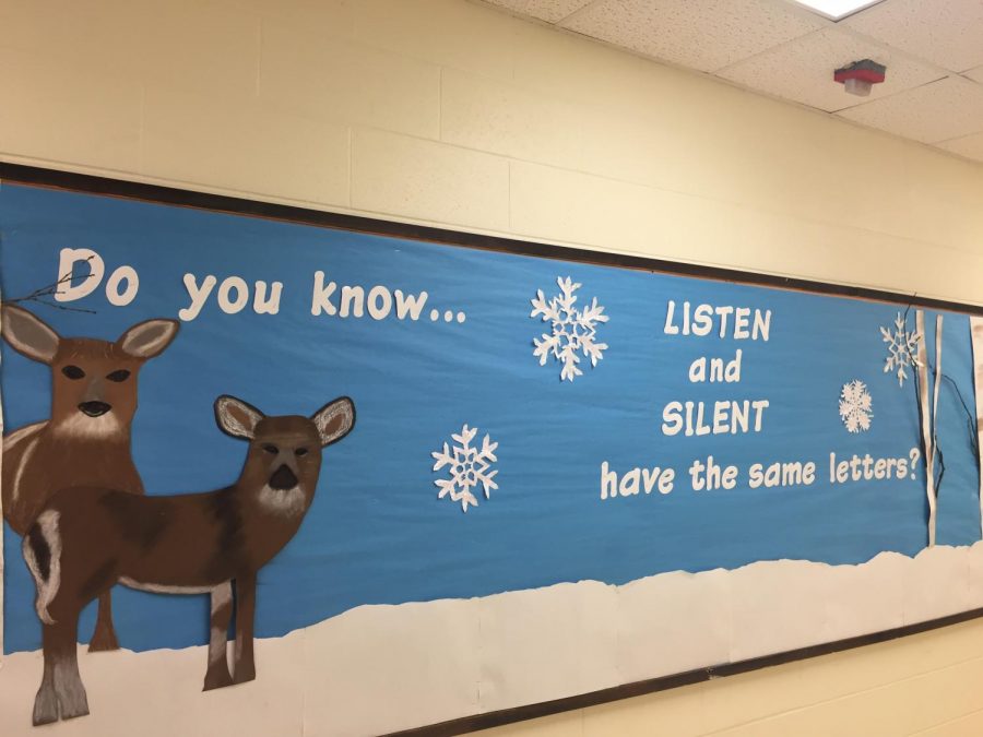 Reindeer and snowflakes decorate the bulletin board outside the main office of Patrick M. Villano School. The board reminds all students that winter break is coming tomorrow.