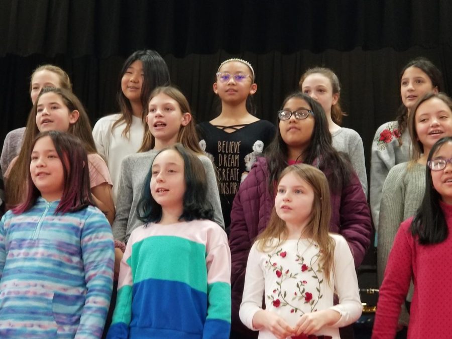 Band and chorus members filled Patrick M. Villano School with holiday spirit during their dress rehearsal for the annual Winter Concert.