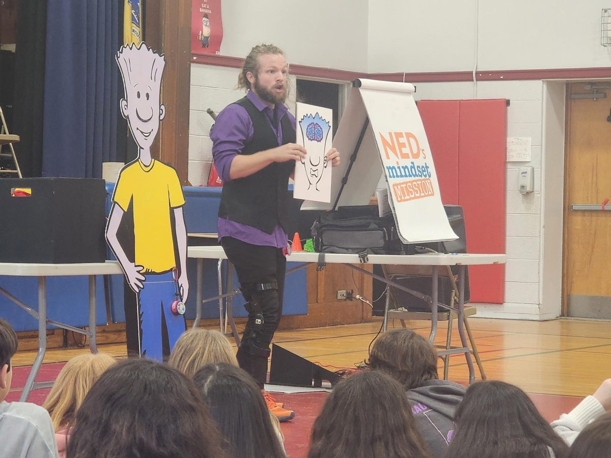 A puppet called NED and yo-yo tricks took center stage during this character education assembly.