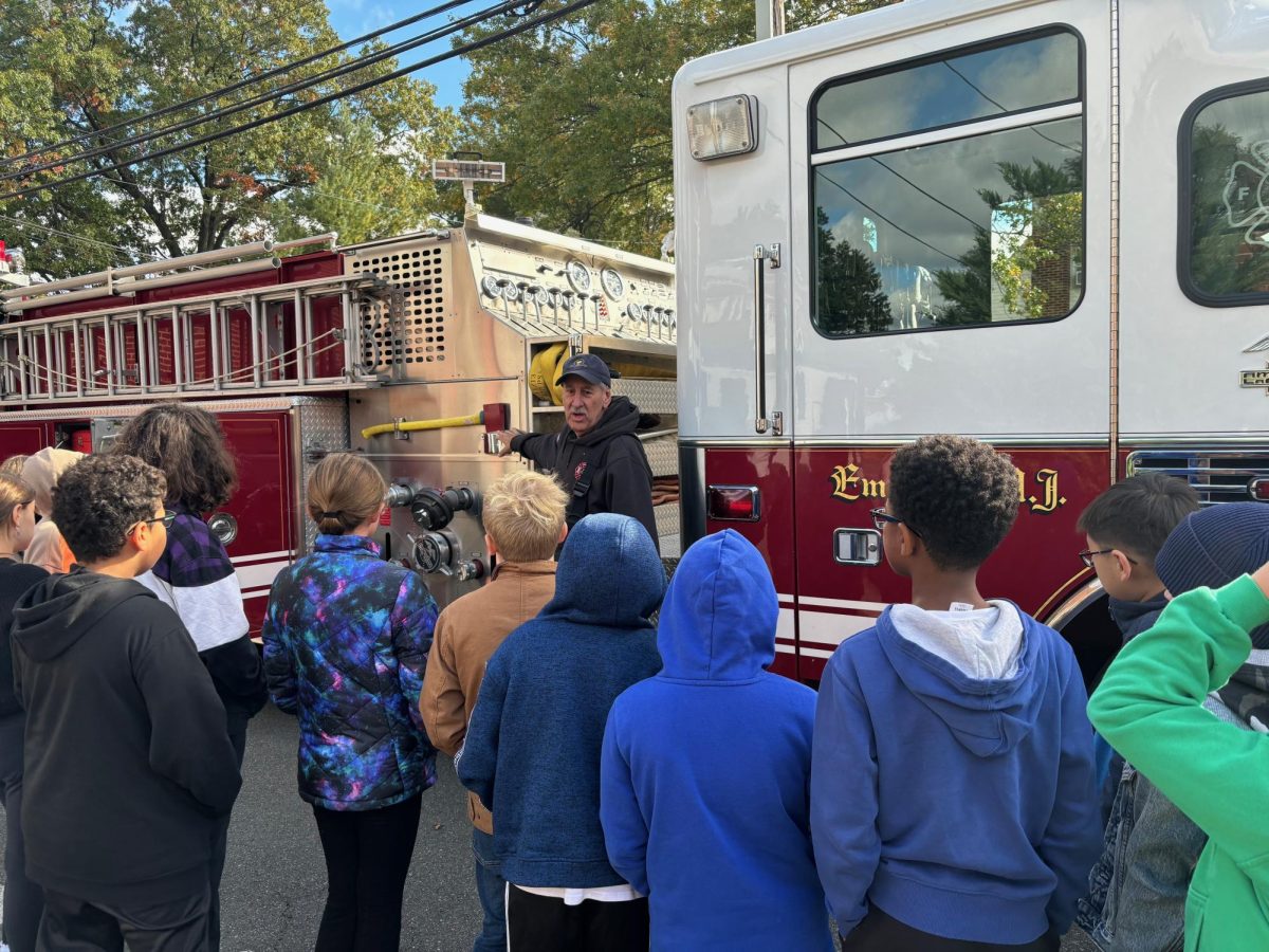 Emerson firefighters talked about their fire fighting equipment with students.