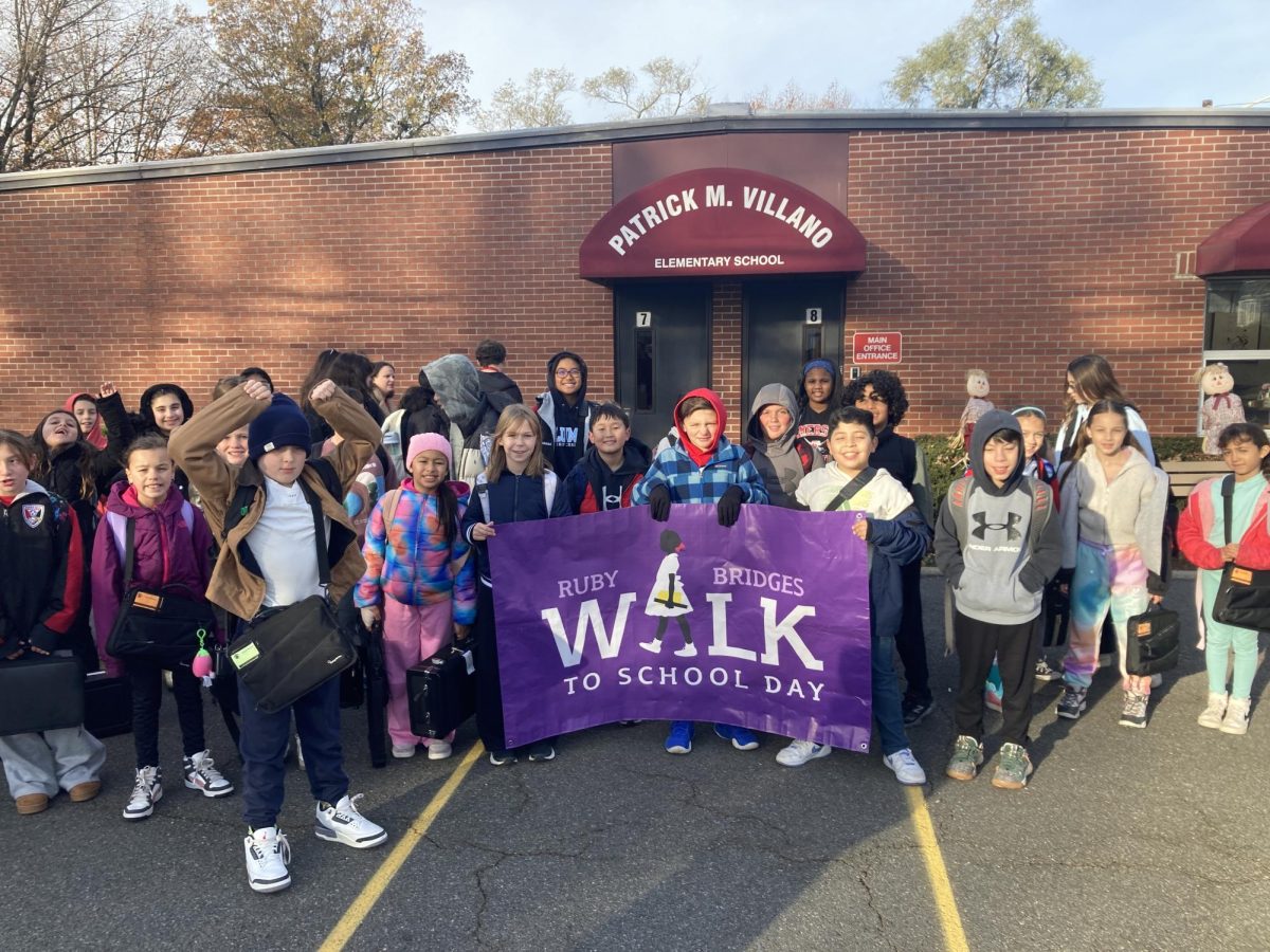 Everyone who participated in the Ruby Bridges Walk to School Day gathered at the final destination.