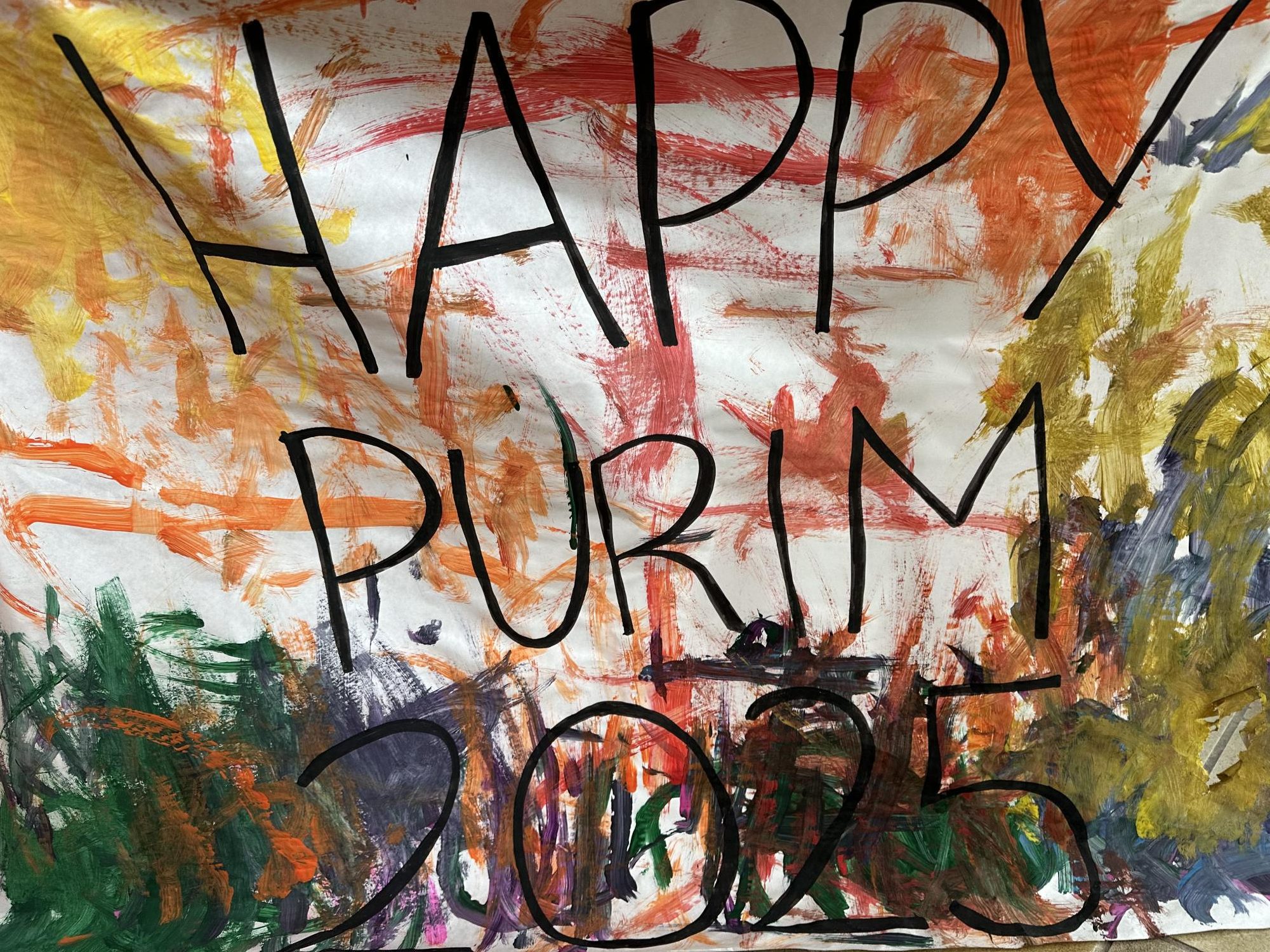 Some children made this poster for the special occasion, Purim. Purim is an important holiday for Jews.