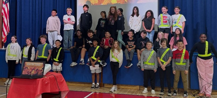 Safety Patrols help lead the monthly O. Show.
