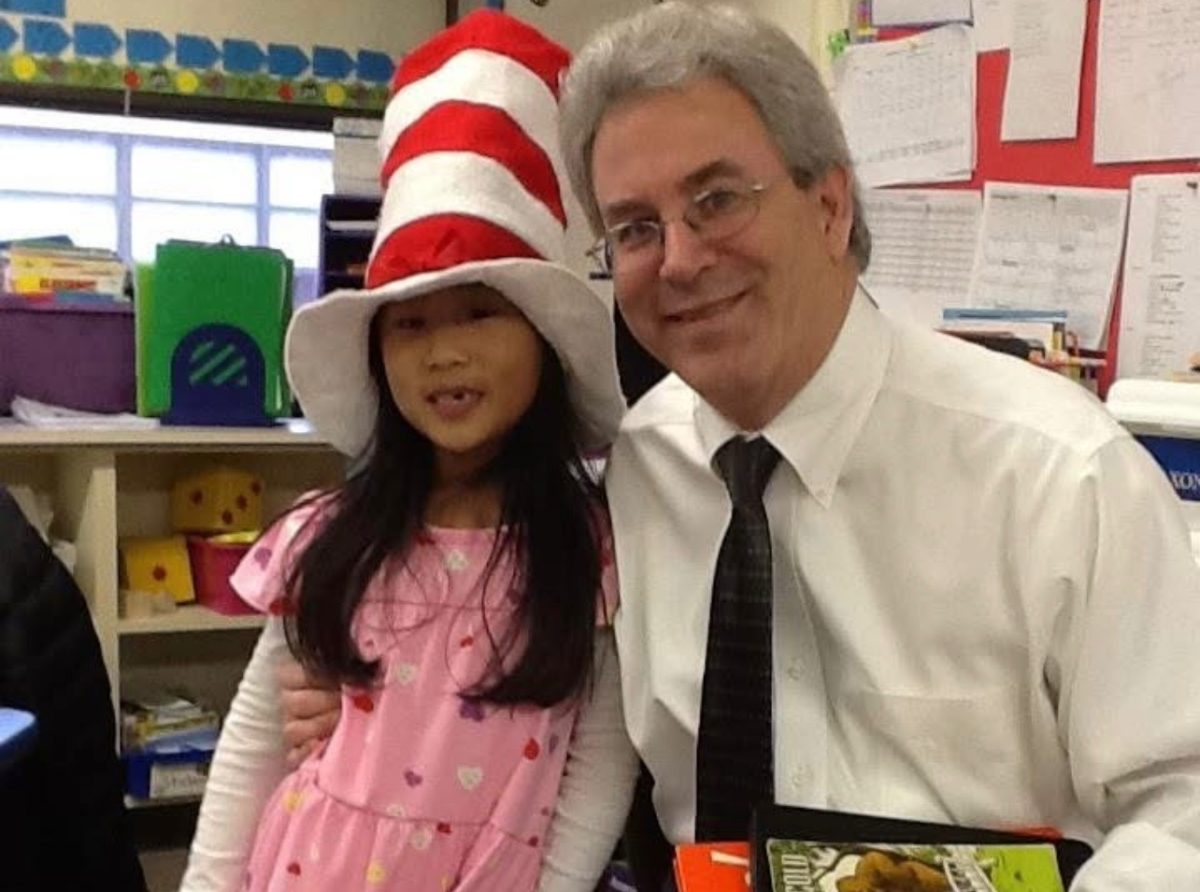 Dr. Phil Nisonoff read to his daughter's elementary classroom on Read Across America Day.