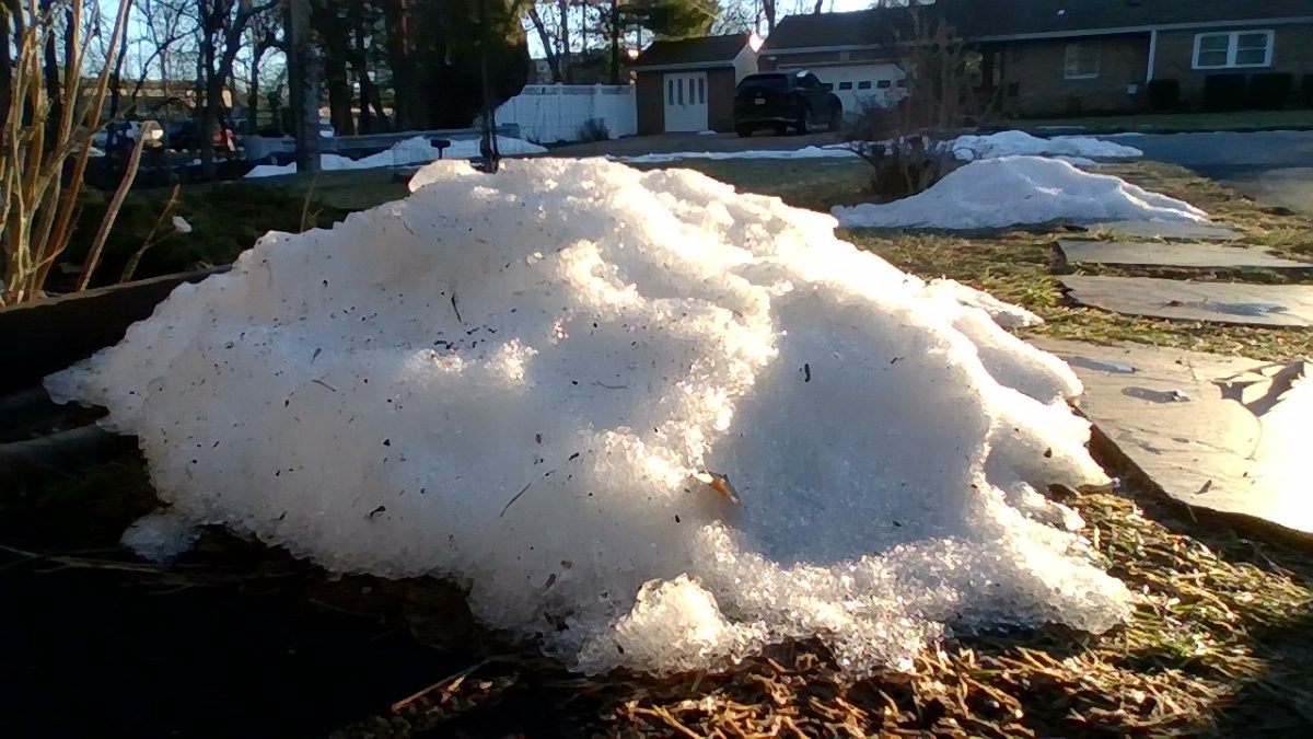 A small mound of snow lingers on the ground in Emerson following a four-inch snowfall.
