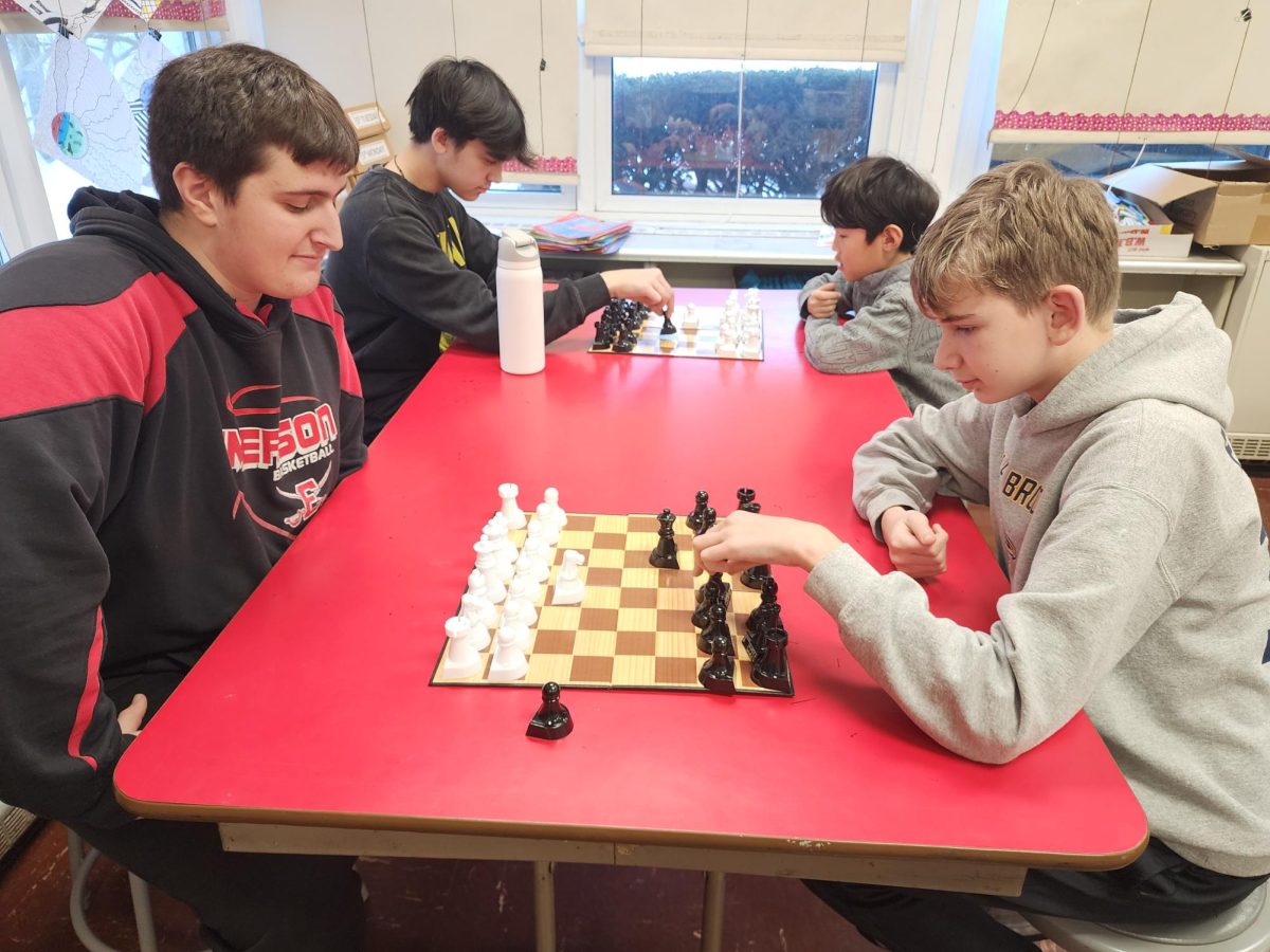 Sometimes, high school students join the chess games after school as a way to earn volunteer hours.