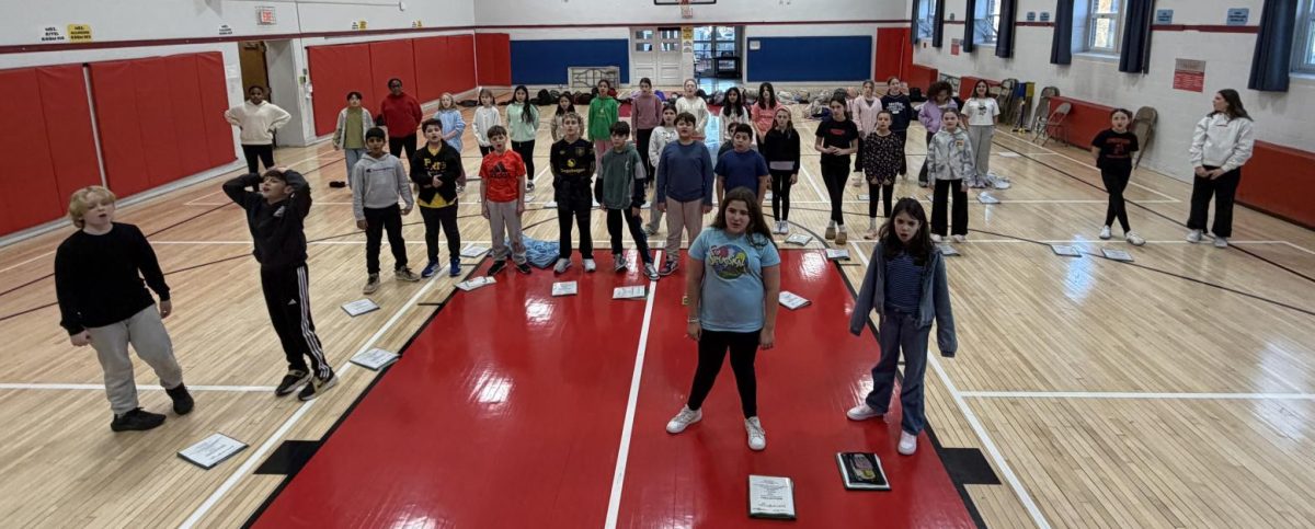 The play cast generally gathers in the school gym to run lines after school.