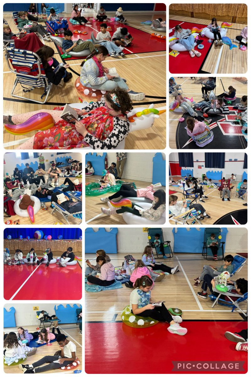Students gathered in the gym to read. The gym was decorated like a beach to cap off an underwater-themed Spirit Week.