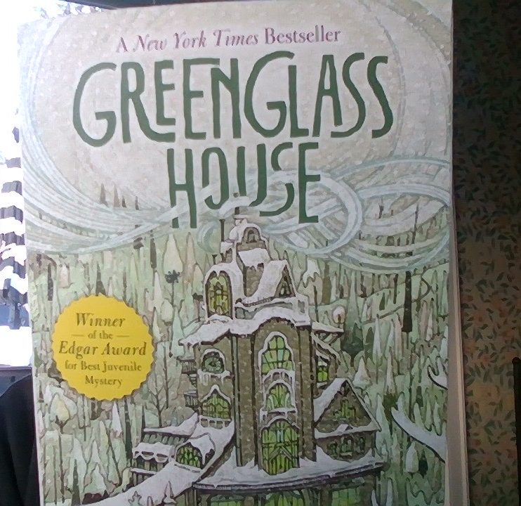 The cover of the book The Greenglass House features a building where all the stories take place. This book won the Edgar Award for being the best mystery book.