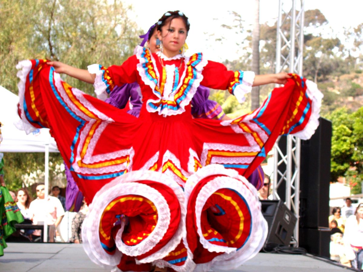 People wear colorful dresses and dance during Cinco de Mayo celebrations to honor Mexican culture and traditions, according to National Geographic online.