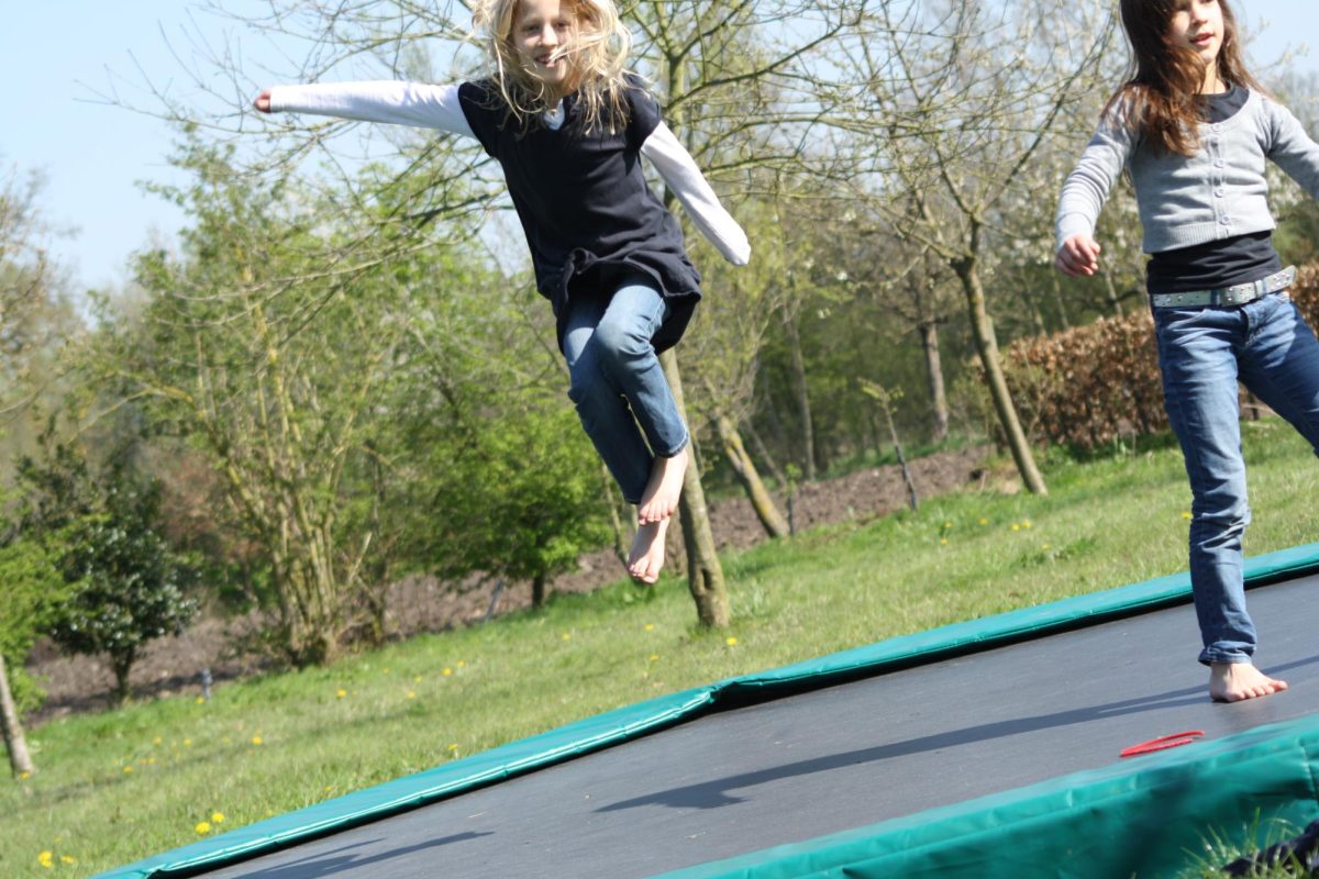 Many kids love to jump on trampolines in their own yards.