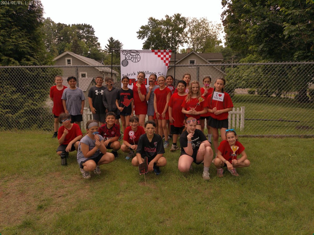 Students wear school colors of red and black on Field Day.