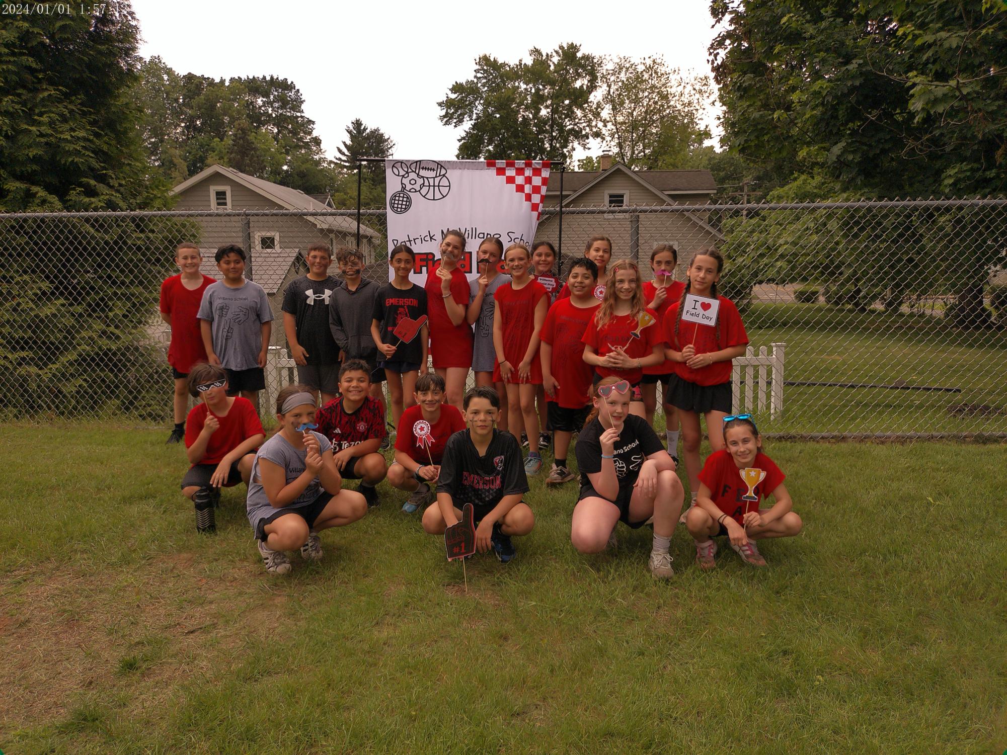 Students wear school colors of red and black on Field Day.