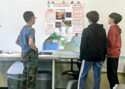 Sixth graders showed what they know about Greek mythology. Through skits, songs, and posters, they presented their ideas earlier this school year.